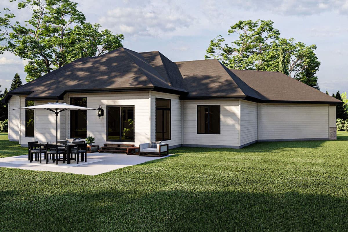 House plan exterior: Ranch style, single story, with a complex roofline, horizontal siding, and large windows.