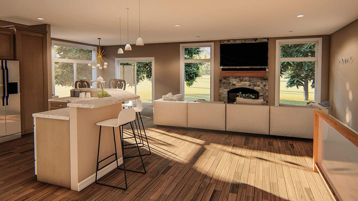Open concept kitchen with island and living area featuring stone fireplace and large windows.