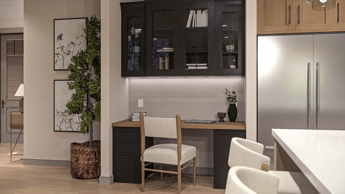 Built-in desk with dark cabinetry, wooden countertop, and patterned backsplash. Stainless steel refrigerator visible.