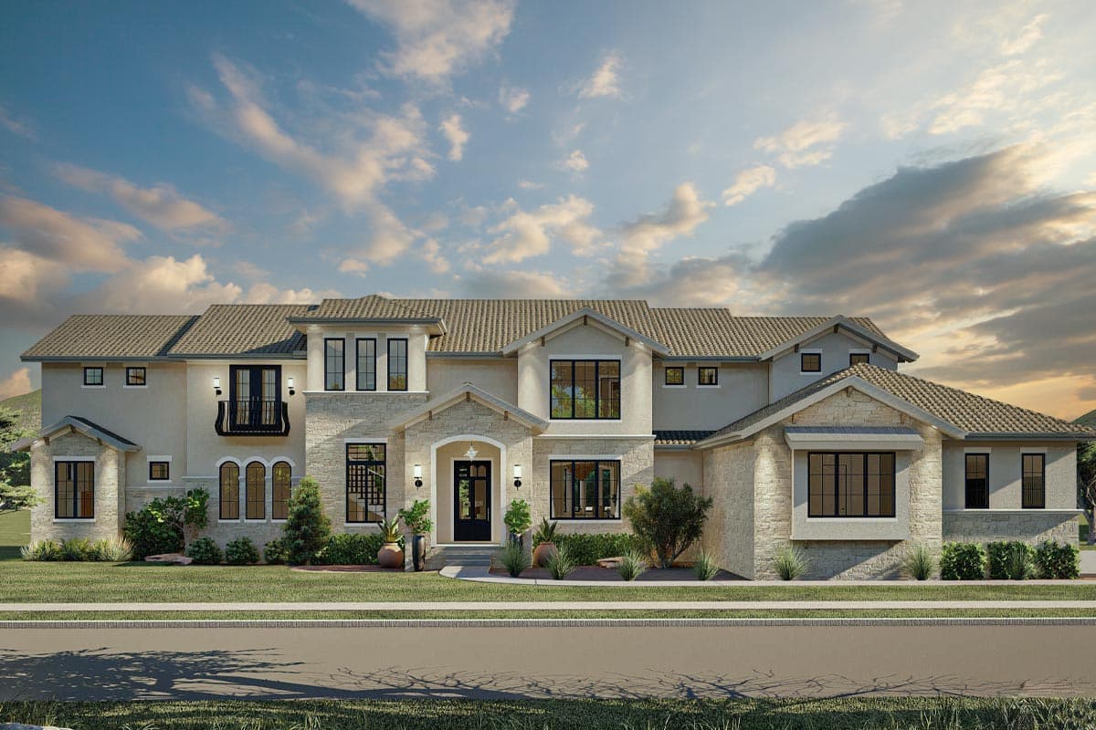 House plan exterior: Two-story home with stone accents, arched windows, balcony, and varied rooflines.