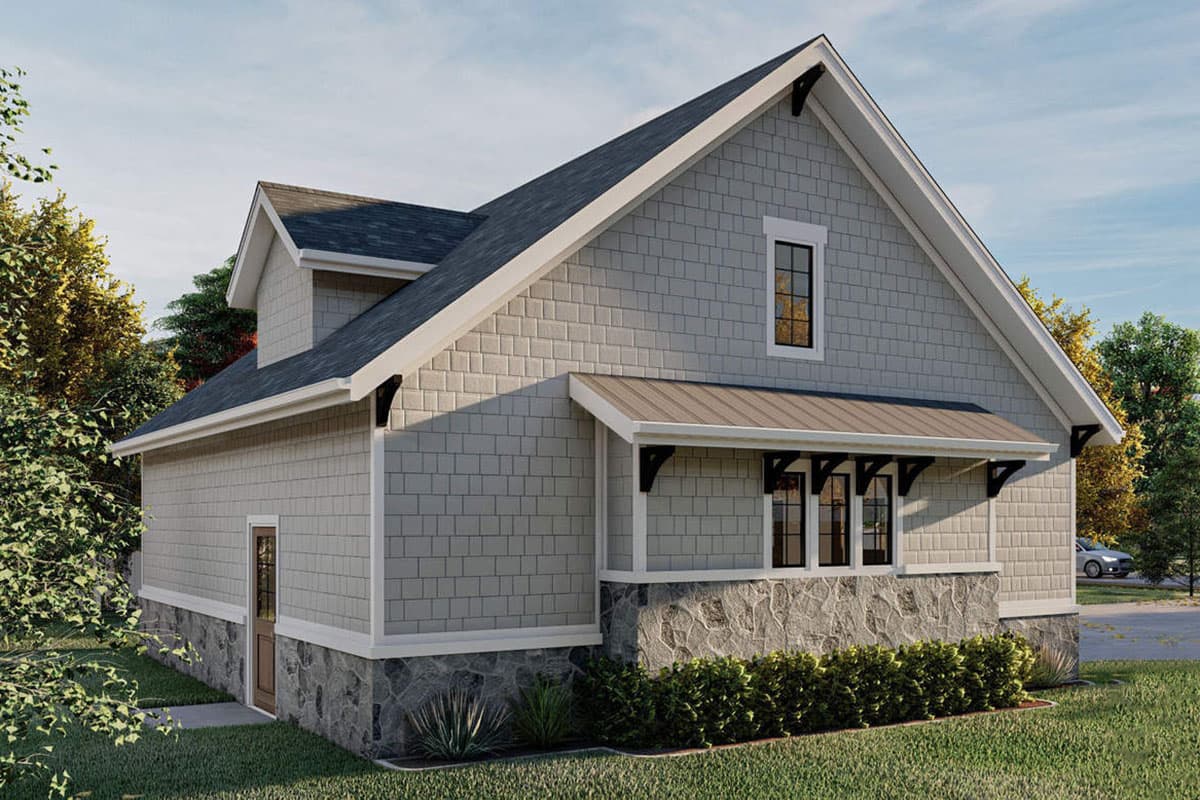 House plan exterior. Modern Farmhouse style, two stories, stone foundation, gabled dormer, and metal awning over windows.