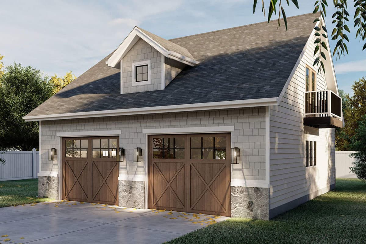 House plan exterior with a dormer, two wood garage doors, and a balcony. Features shake siding and stone base.