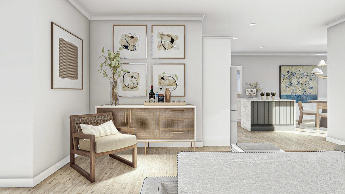 Interior rendering showing a living area with abstract art, a cane-front credenza, and view of a kitchen with island.