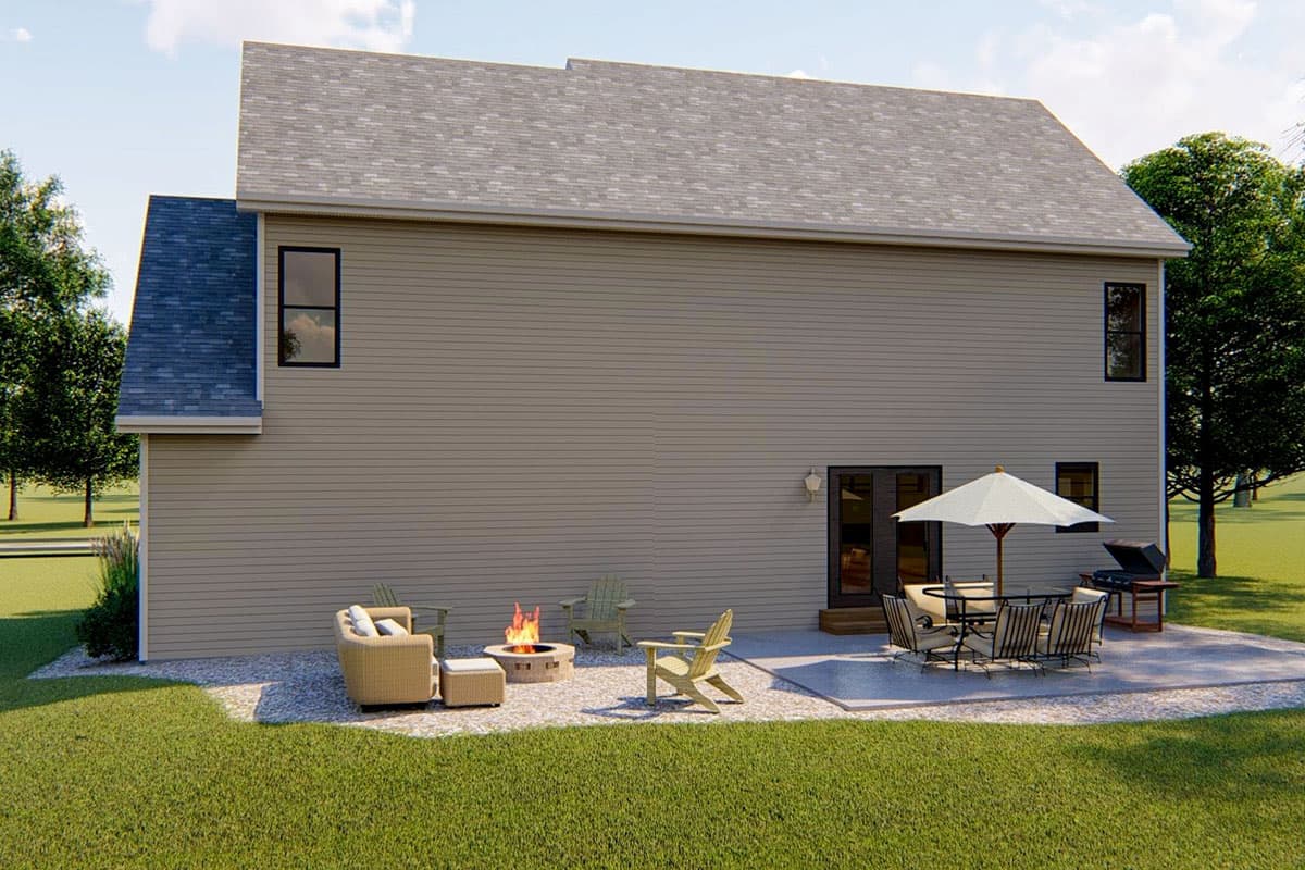 House plan exterior, two stories, siding walls, dual-pane windows, rear patio with furniture and grill.