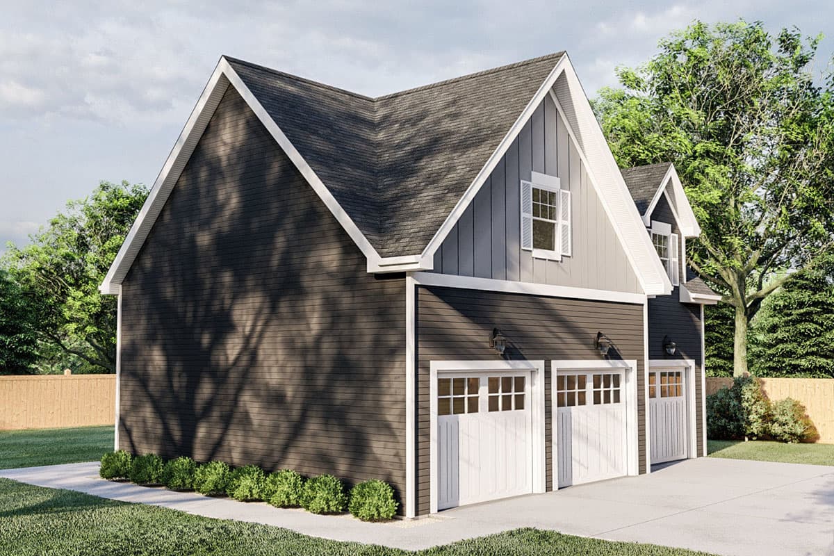 Modern Farmhouse house plan exterior with a three-car garage, gabled dormers, and white-paneled garage doors.