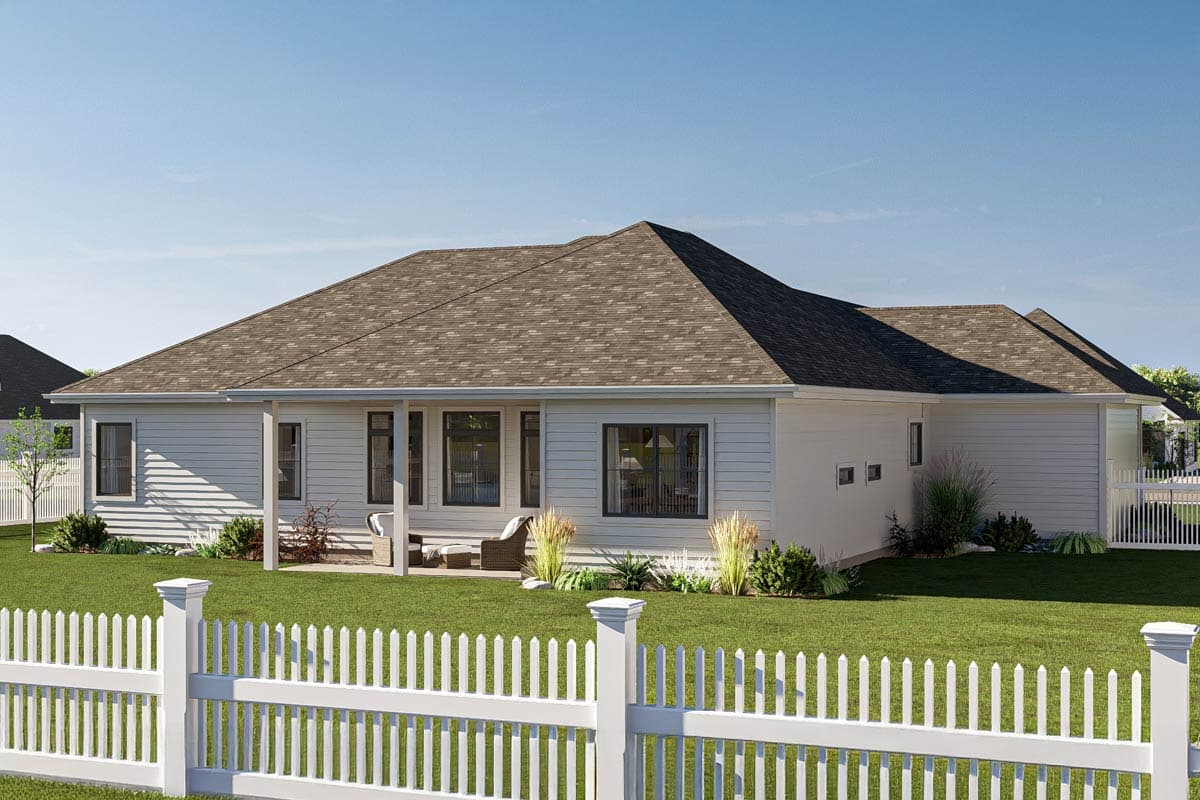 House plan exterior: single-story modern home with white siding, hip roof, covered porch, and picket fence.