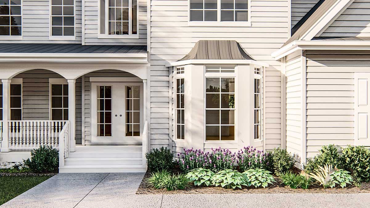 House plan exterior: Two-story home with a covered porch, double front doors, and a bay window with a metal roof.