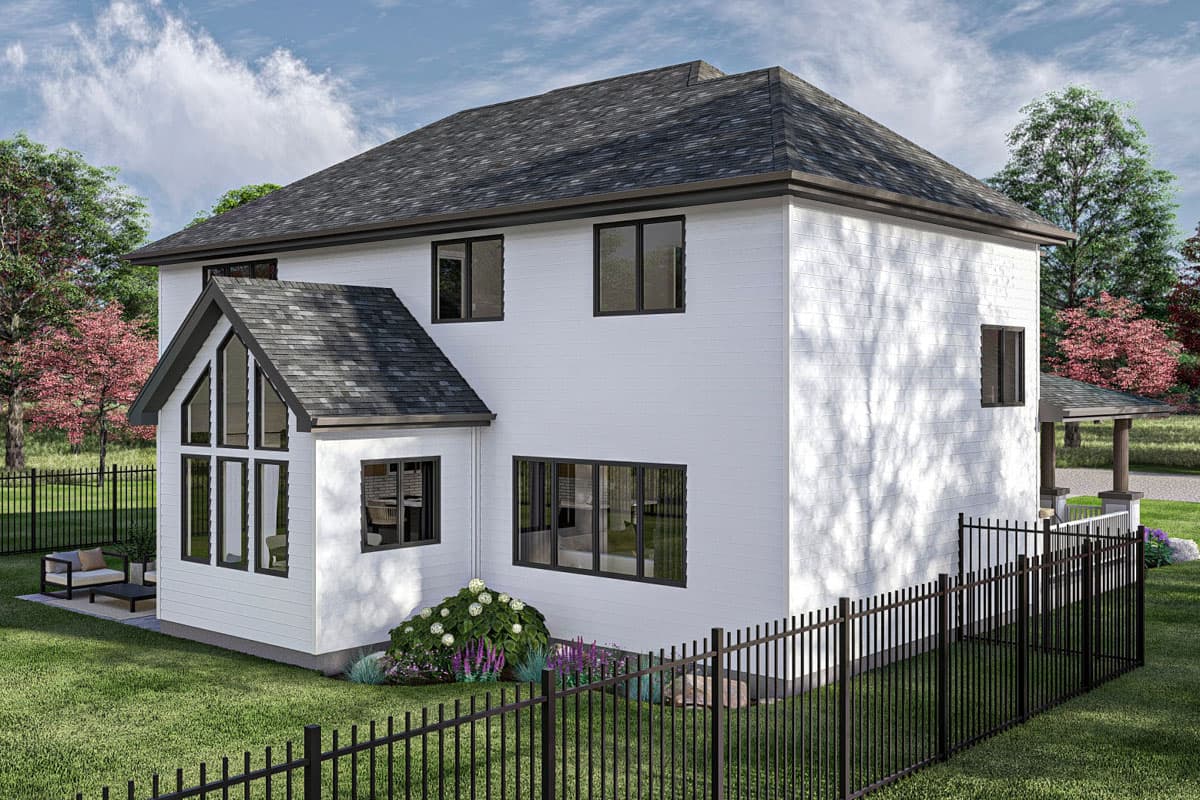 House plan exterior: two-story modern home with white siding, dark-framed windows, and a prominent gable with tall windows.