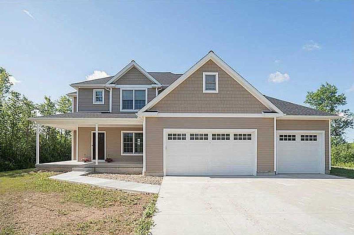 Two-story house plan exterior with a wraparound porch, a prominent gable with dormer, and a three-car garage.