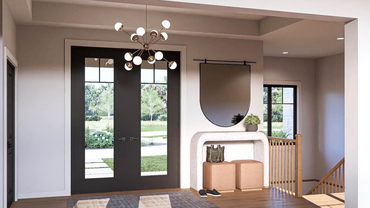 Entryway with double doors, console table, large mirror, staircase, and modern chandelier.