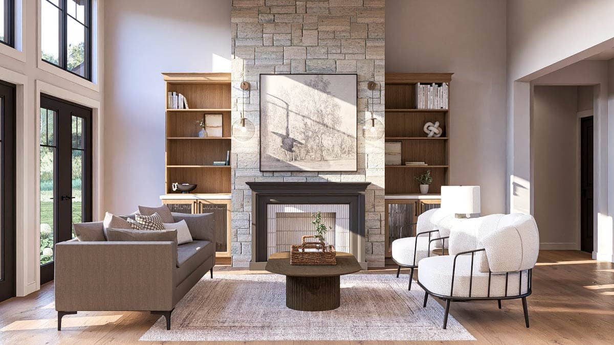 Great room with stone fireplace, built-in bookshelves, large windows, and double doors.