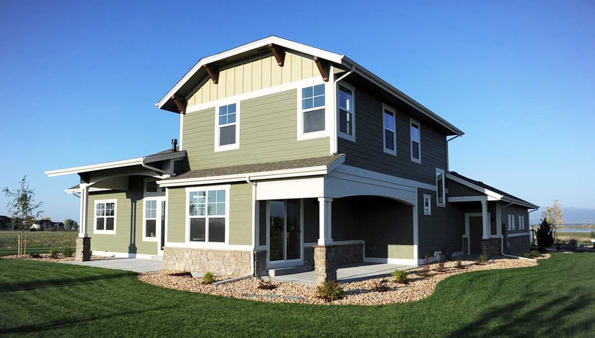 House plan exterior: Two-story Modern Farmhouse with gables, exposed rafter tails, stone accents, and covered porch.
