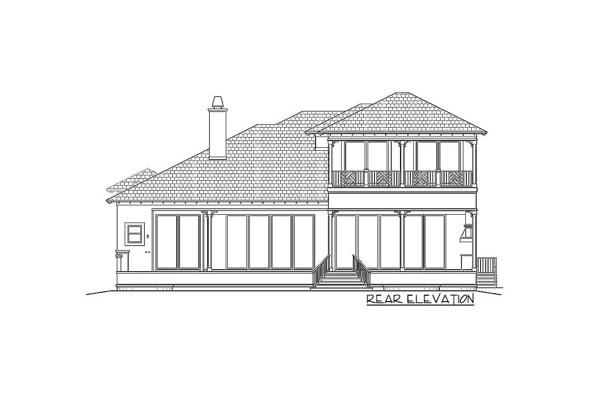 Rear elevation drawing of a two-story house plan featuring a prominent chimney, multiple gables, and a second-story balcony with ornate railings.