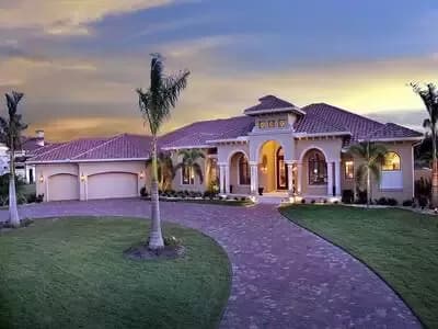 Spanish-Influenced One-Story House Plan with Angled 3-Car Garage - 4934 Sq Ft