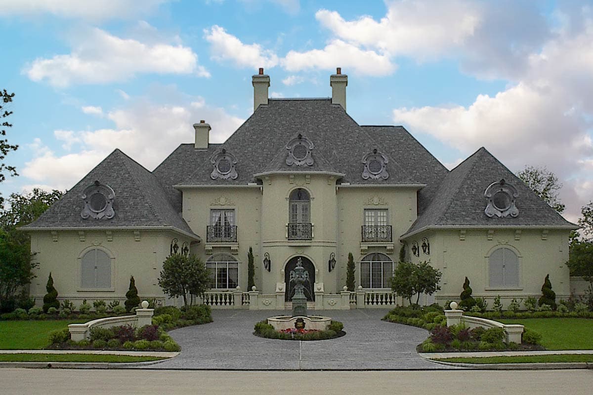 House plan exterior: French Baroque style, two stories, prominent mansard roof, dormers with decorative surrounds, and central porte-cochère.