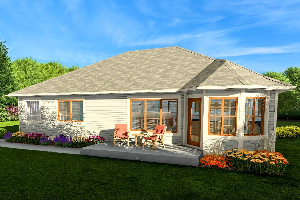 House plan exterior: Single-story home with lap siding, hipped roof, bay windows, and a concrete patio with two chairs.