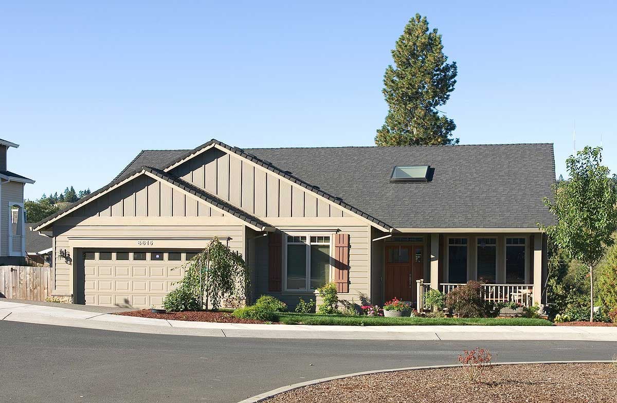 House plan exterior: One-story Modern Farmhouse with attached garage, gabled dormer, and covered front porch.