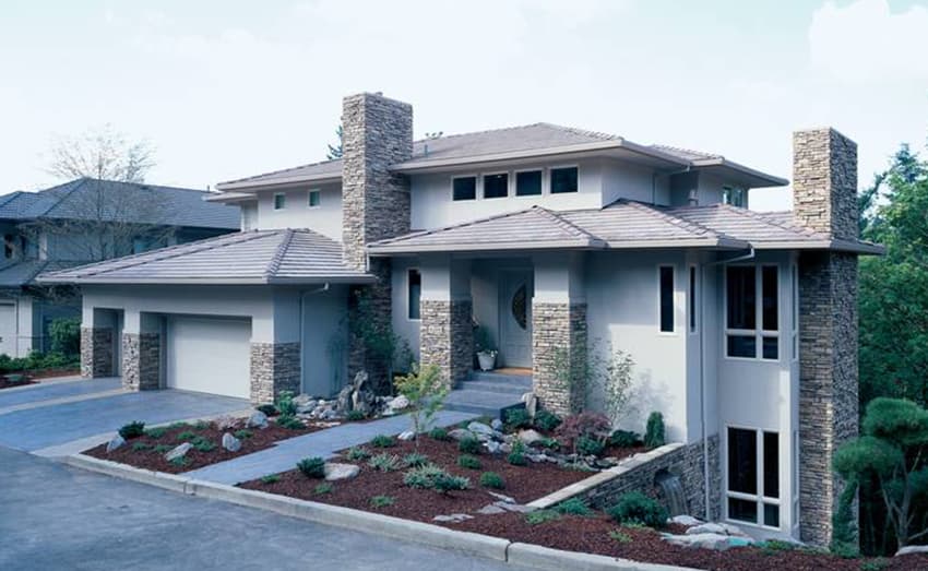 House plan exterior: Contemporary style, two stories, attached garage, stone accents on chimney and columns, tiled roof, and prominent gables.
