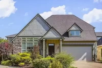 Small Family Cottage Plan with Vaulted Ceilings