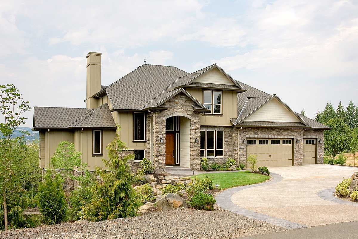 House plan exterior with stone accents, gable roof, and attached garage. The two-story house features a covered entryway and chimney.