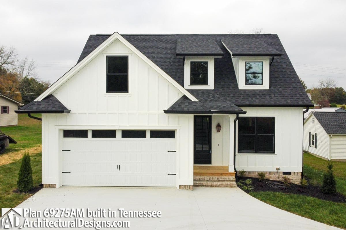 Modern Farmhouse house plan exterior with board and batten siding, gables, dormers, and attached two-car garage.