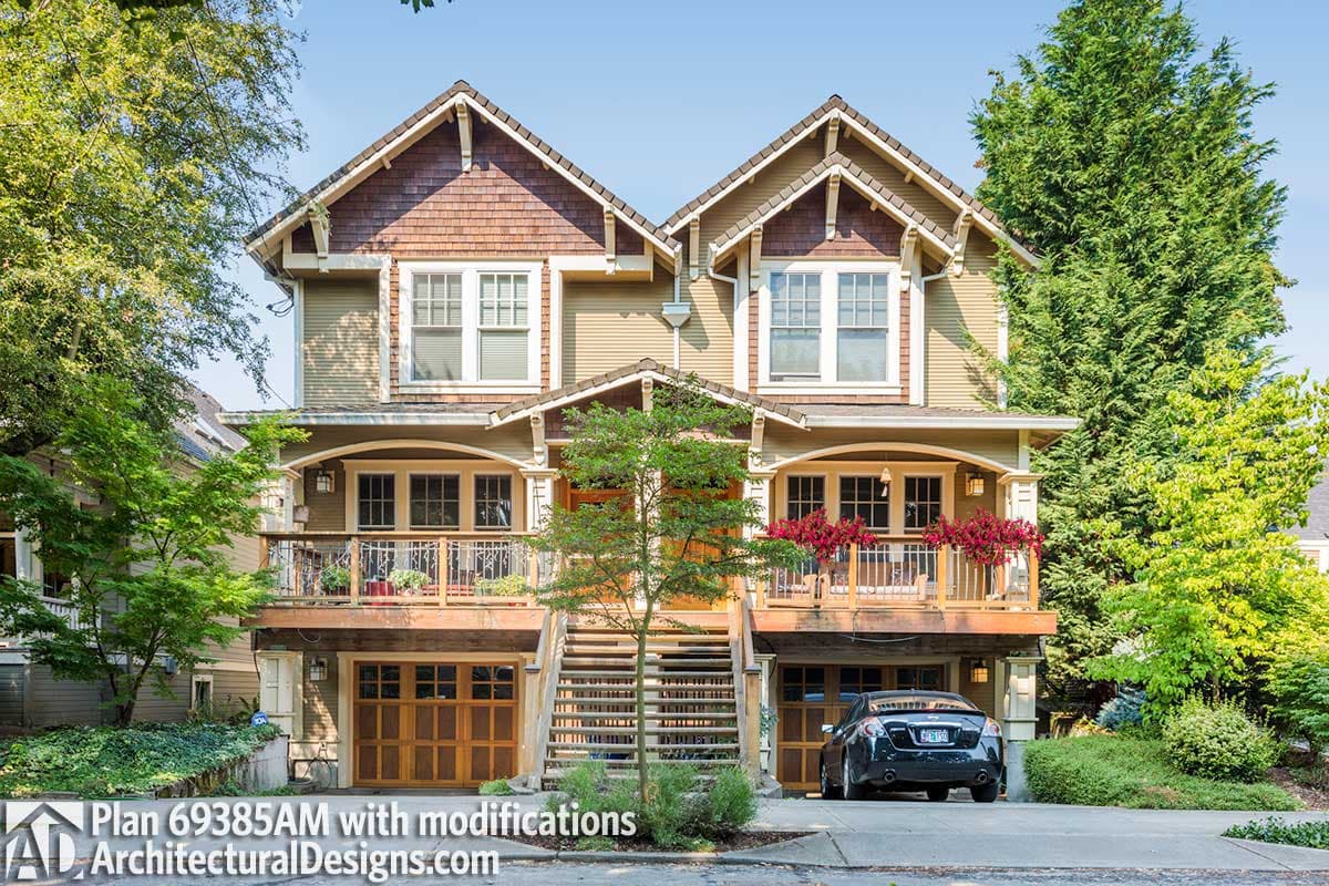 Craftsman style house plan exterior featuring twin gables, covered porches, and double garage doors.