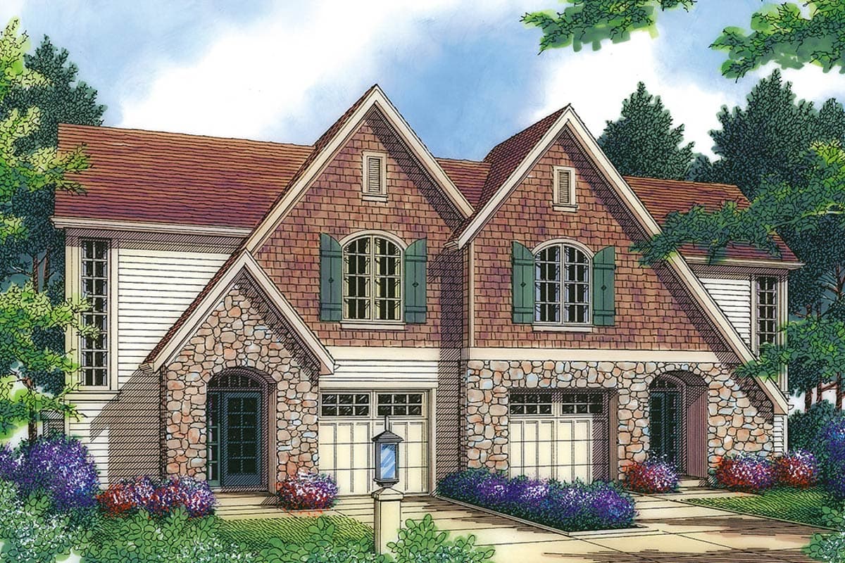 House plan exterior featuring stone accents, arched entryway, two garage doors, dormers, and steeply pitched gables.