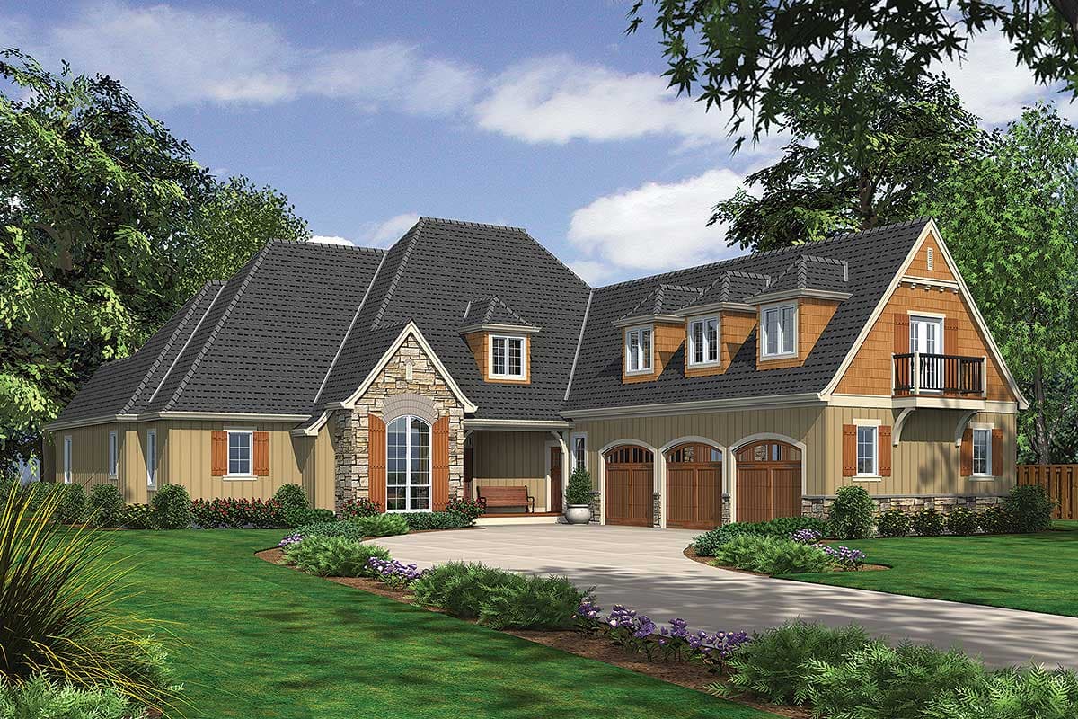 House plan exterior: French Country style with stone accents, dormer windows, balcony, and a three-car garage.