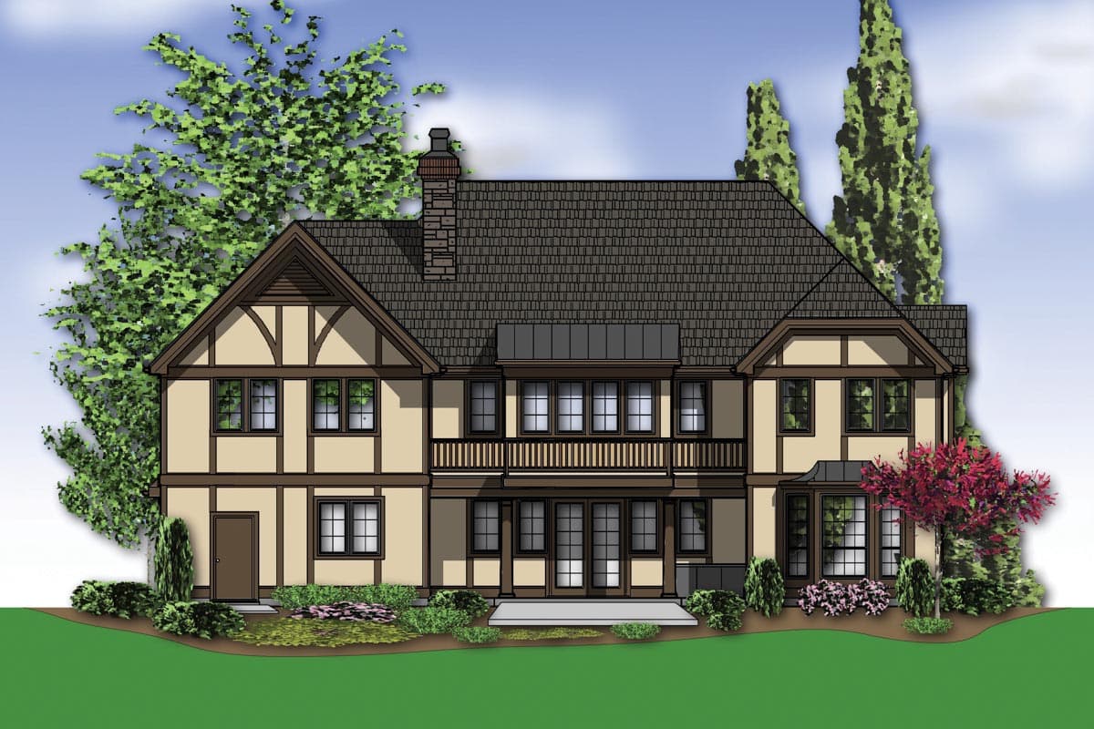 Tudor style two-story house plan exterior with prominent gables, decorative half-timbering, and a second-story balcony.