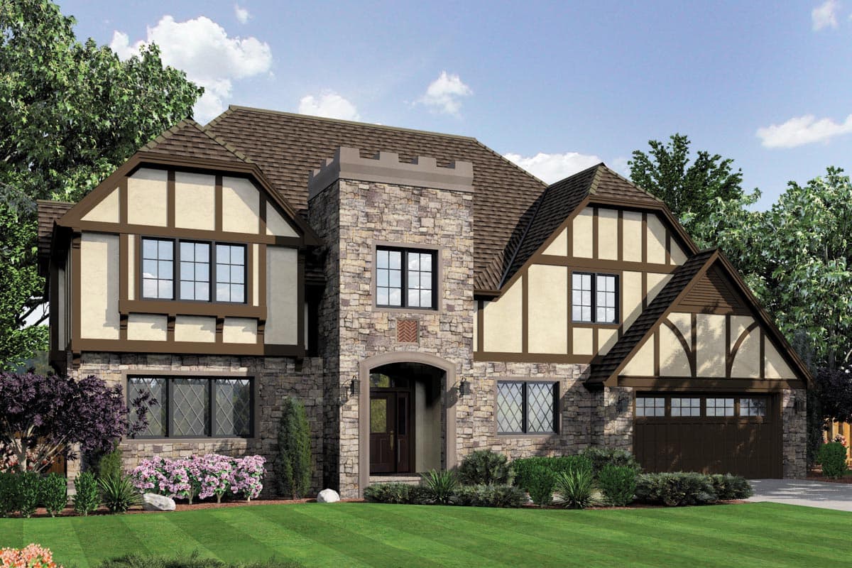 Tudor style house plan exterior with stone accents, half-timbering, prominent gables, and a turretted entryway.