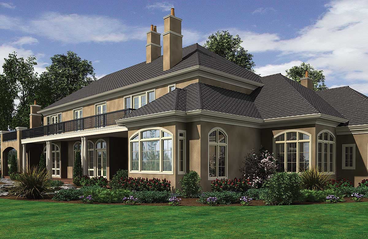 House plan exterior: Two-story residence with a second-story balcony, arched windows, and multiple gables.