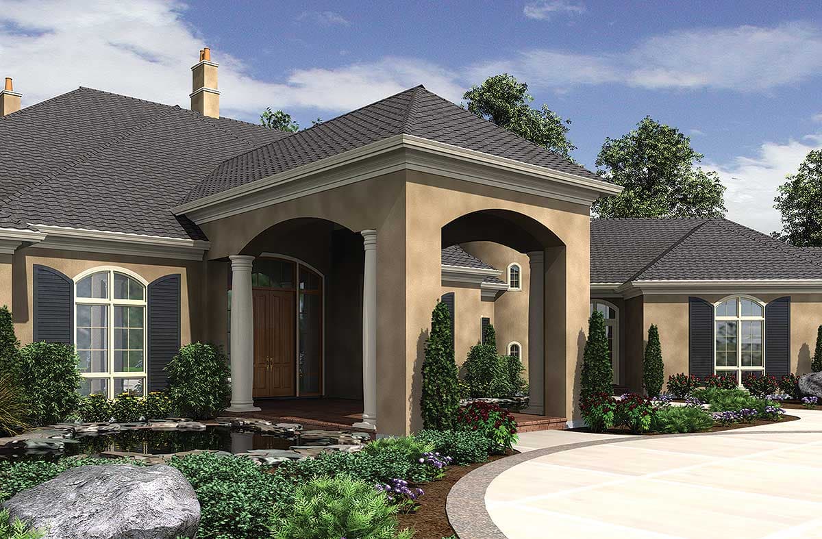 House plan exterior with arched entryway, columns, arched windows with shutters, and a water feature.