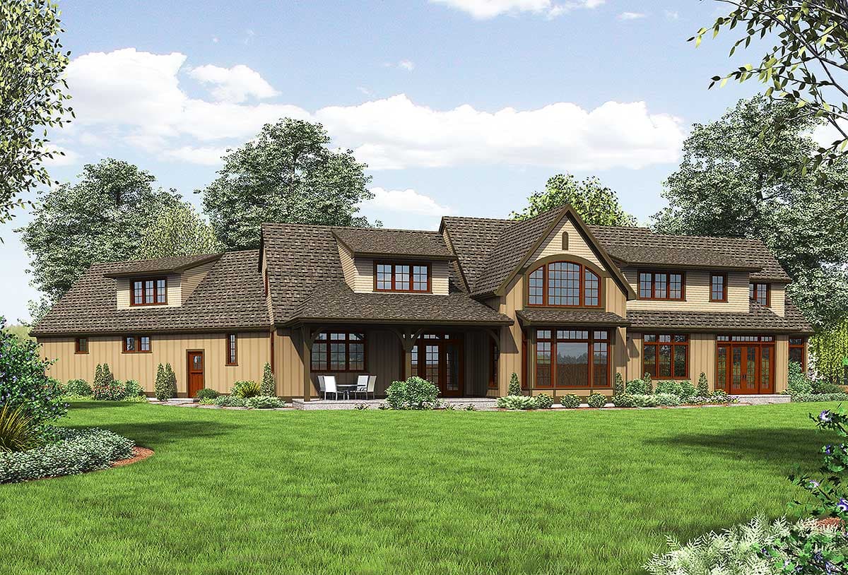 House plan exterior: Two-story lodge style with intersecting gables, dormers, wood siding, and a covered porch.