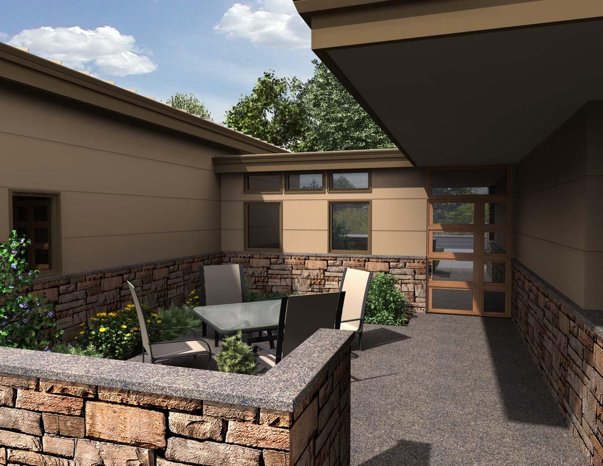 Modern house exterior with stone accents, horizontal siding, clerestory windows, and a glass-paneled entry door.