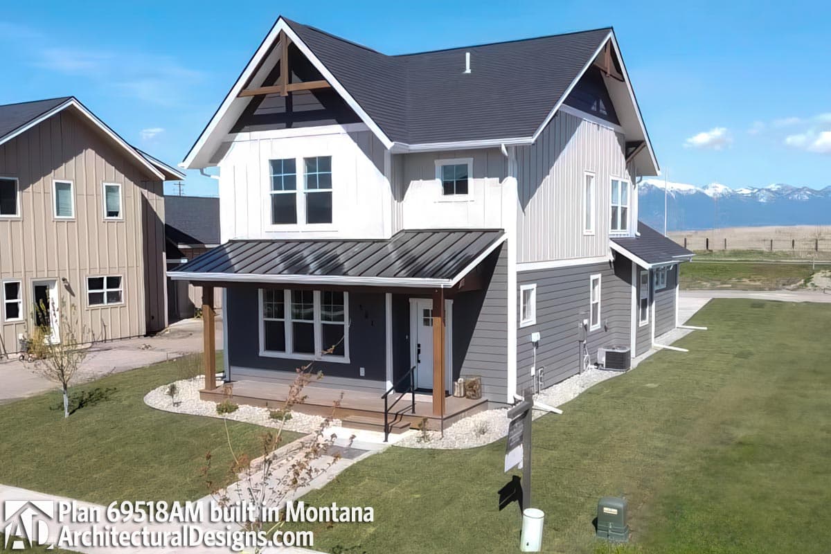 House plan exterior of a two-story Modern Farmhouse with a covered front porch, metal roof, and board and batten siding.