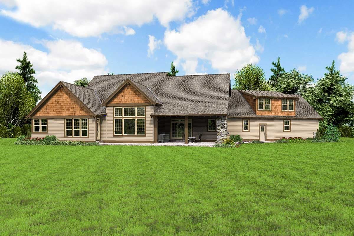 House plan exterior: two-story, large gabled dormers, stone accent, covered patio, and extensive window walls.