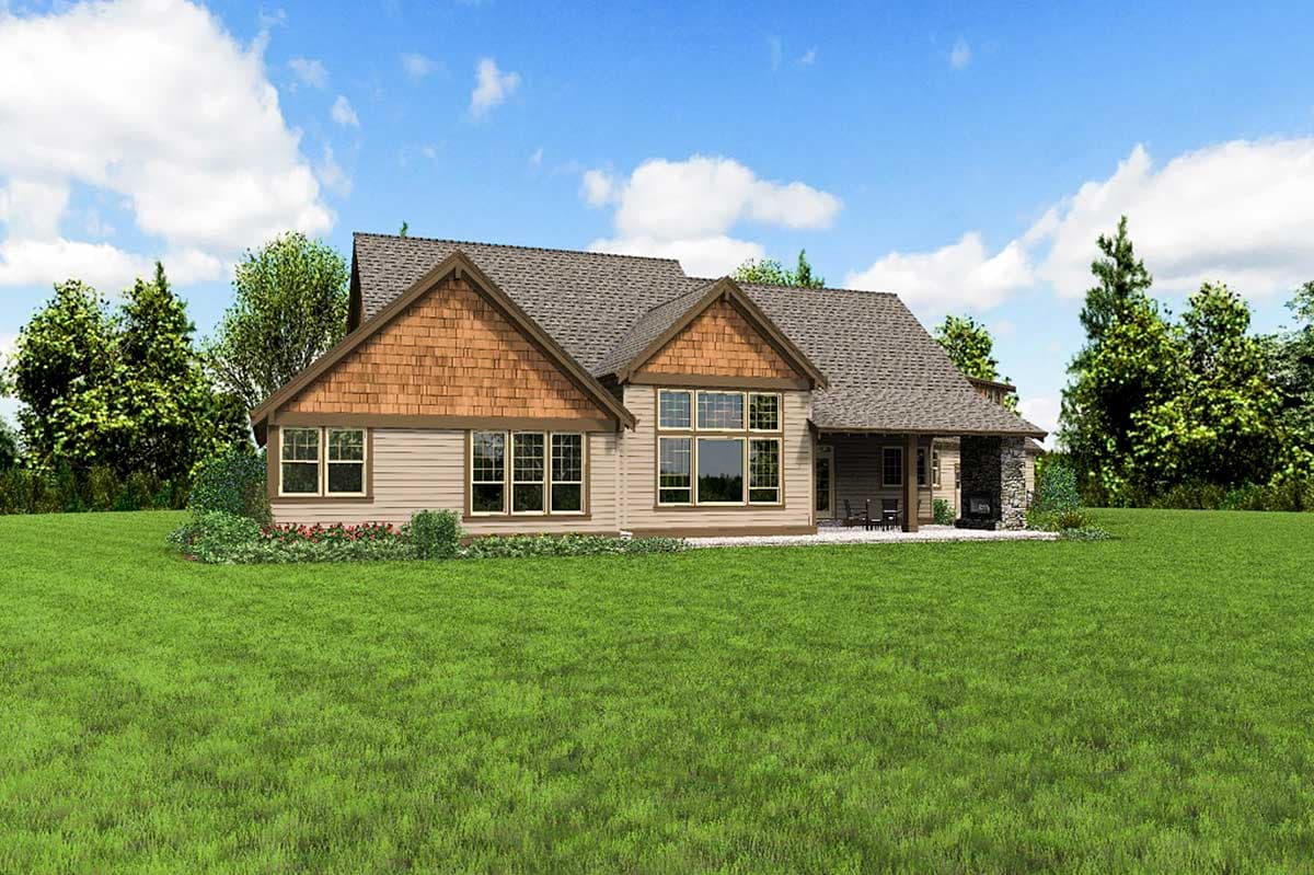 Craftsman style house plan exterior with cedar shake gables, multiple dormers, large window wall, and covered porch with stone fireplace.