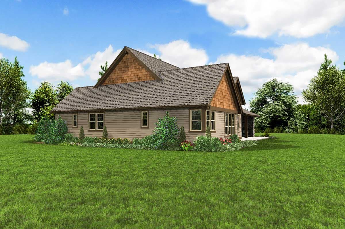 House plan exterior: Ranch-style home with shingle siding, prominent gables, and multiple windows.
