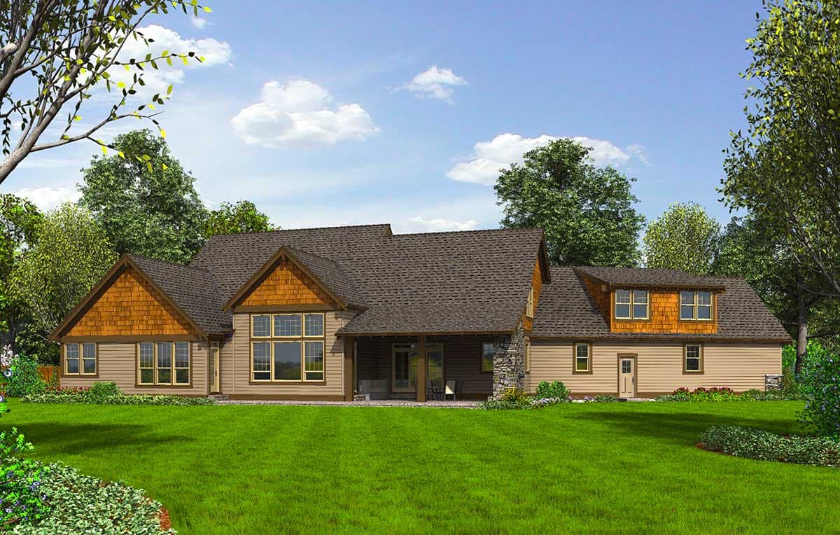 House plan exterior. Ranch style, one story with multiple gables, cedar shake siding, and stone accents.