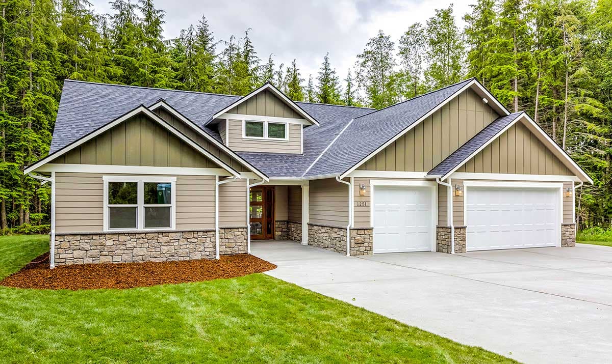 House plan exterior with two-car garage, multiple gables, and stone veneer foundation. Features include a front porch and a neutral color scheme.