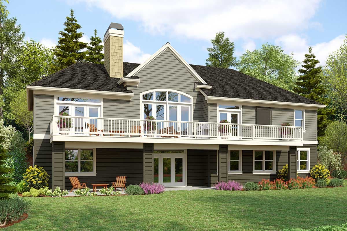 House plan exterior: Two-story home with upper deck, gabled dormer, arched window, and stone chimney.