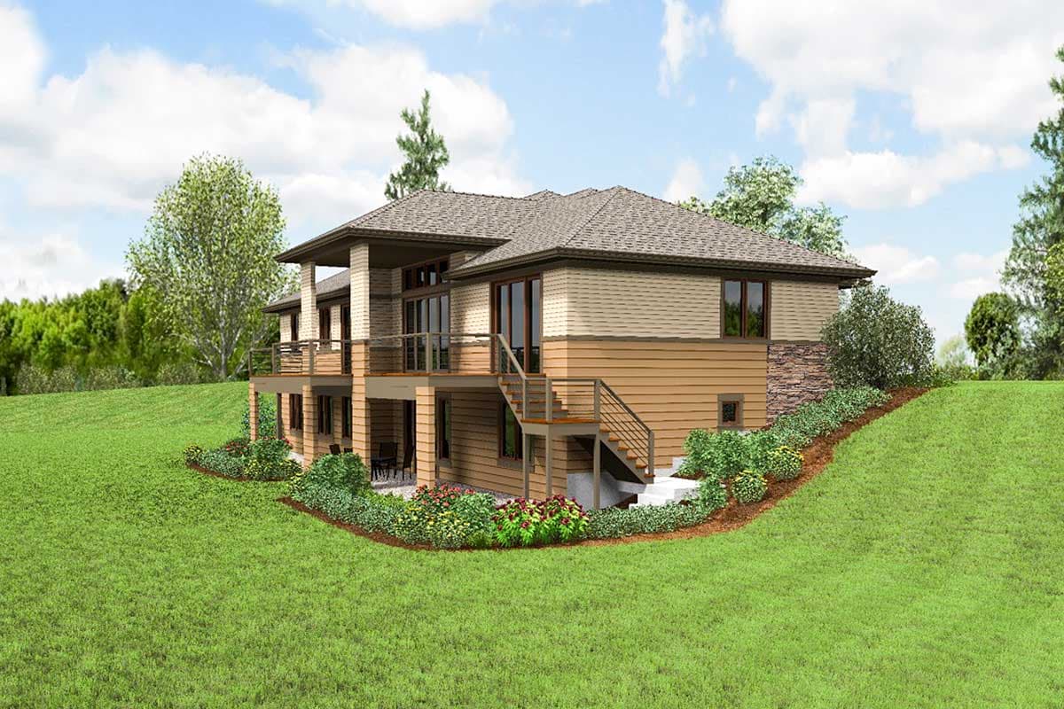House plan exterior: Two-story home with a wraparound deck, brick accents, and horizontal siding.