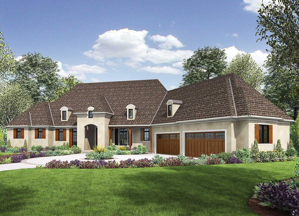 French Country house plan exterior with arched entryway, dormers, and a three-car garage.