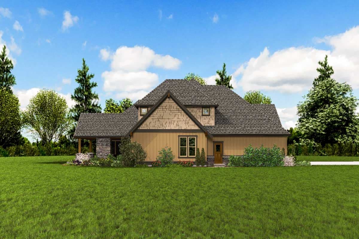 House plan exterior: One-and-a-half story with stone accent, prominent gable with shingle siding, and covered porch.