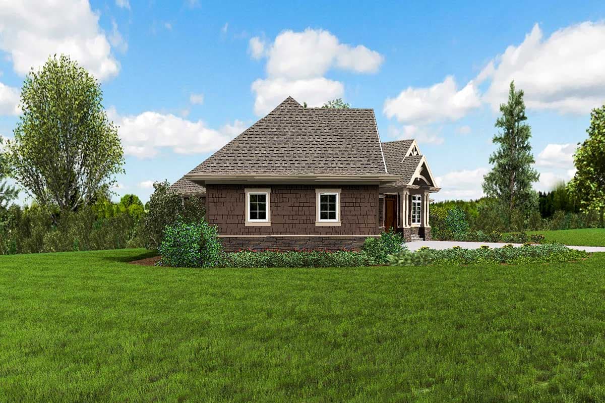 House plan exterior: Ranch style with shingle siding, prominent gables, and a covered front porch.