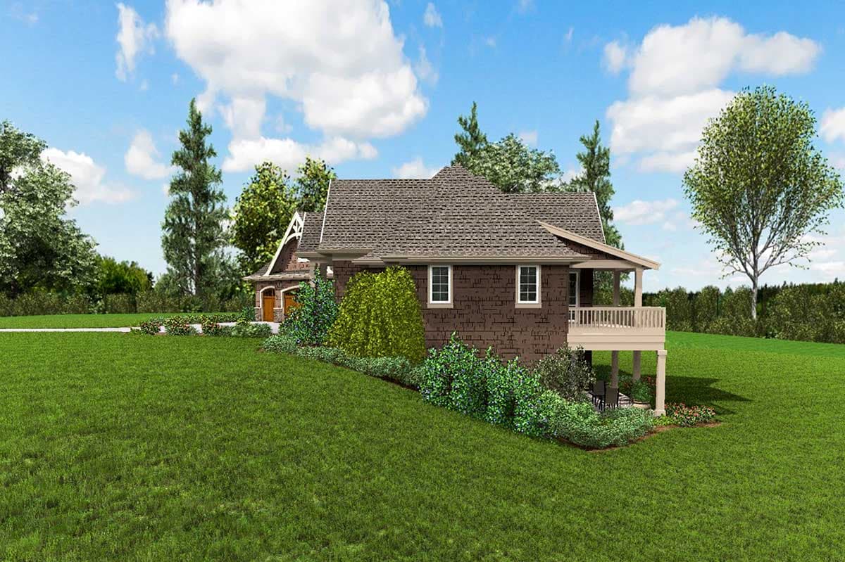 House plan exterior: Two-story home with steeply pitched roof, gable end, covered porch, and attached garage. Shingle siding.
