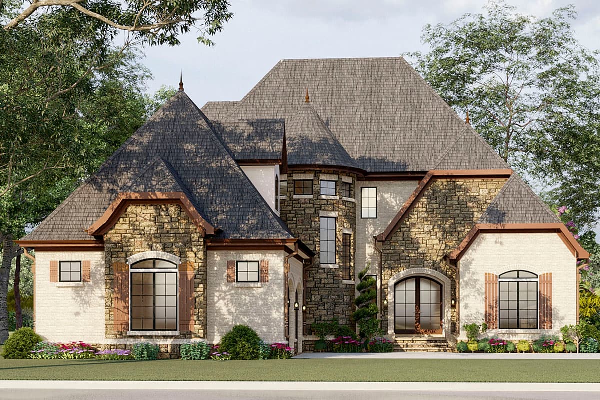 House plan exterior with stone and brick facade, steeply pitched rooflines, multiple gables, and arched entry.