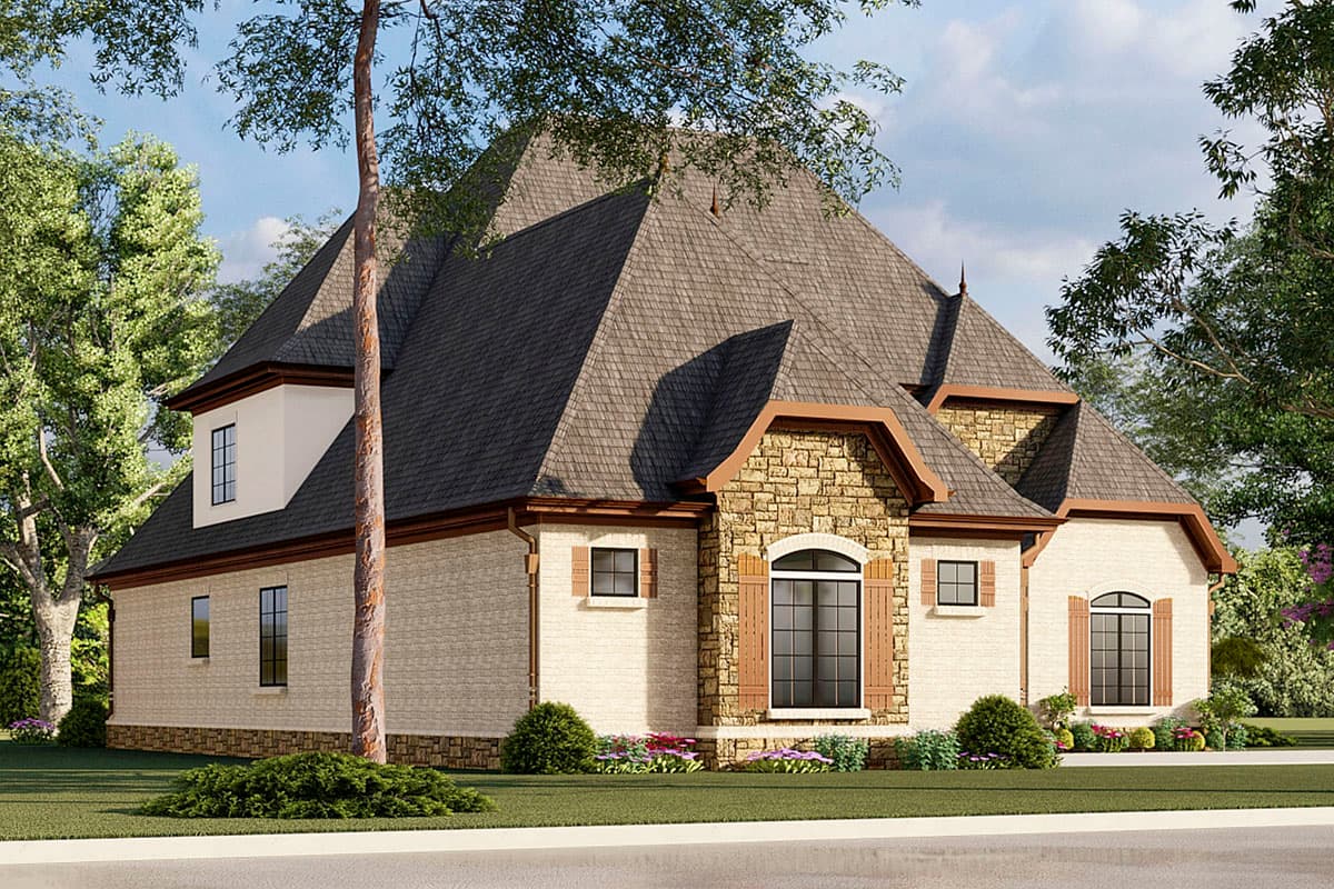 House plan exterior with stone accents, steep gabled roof, dormer window, and arched windows with shutters.