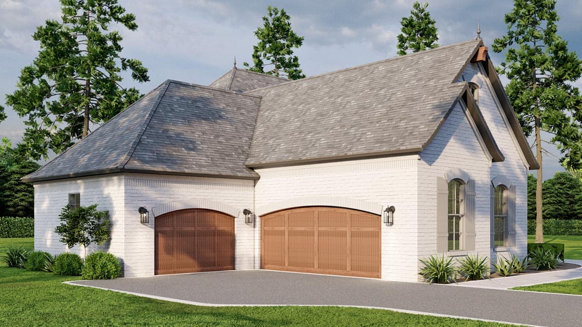 House plan exterior: Brick, three-car side-entry garage with arched doors, dormers, and peaked roof.