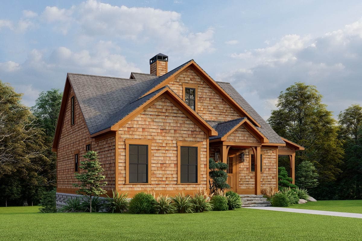 House plan exterior: Two-story home with cedar shingles, stone foundation, prominent gables, and a covered entry porch.